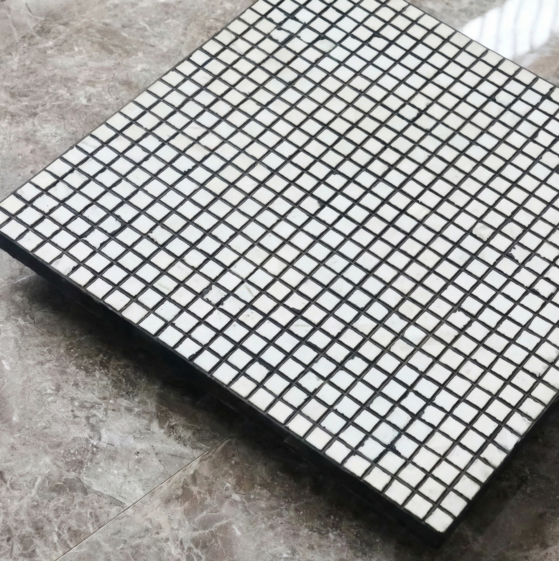 Ceramic liner rubber backing